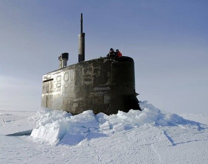 Submarine breaking through the ice